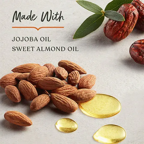 Image 1, Made with jojoba oil, sweet almond oil. Image 2, Indulge our signature scent of Jasmine, Grapefruit and Vanilla