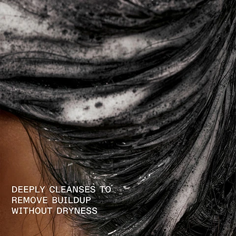 Image 1 - A close-up image of dark hair covered in foamy cleanser with the text deeply cleanses to remove buildup without dryness.
              Image 2 - A close-up of a bottle of Olaplex No. 4C Bond Maintenance Clarifying Shampoo with bubbles on the surface and the text IMPROVES COLOR VIBRANCY, SHINE, AND SOFTNESS displayed on the image.
              Image 3 - The image shows two side-by-side views of a persons hair, with the left side labeled BEFORE displaying frizzy, unkempt hair, and the right side labeled AFTER showing smooth, straight hair. Visible text states UNTouched IMAGES and provides details on the hair care products used.
              Image 4 - Image shows a split comparison of curly hair labeled BEFORE on the left with frizzy, dull curls and AFTER on the right with smooth, defined curls; visible text at the bottom includes *Results achieved by cleansing with N°4C Bond Maintenance® Clarifying Shampoo, conditioning with N°8 Bond Intense Moisture Mask, and applying N°9 Bond Protector Nourishing Hair Serum to damp hair before styling.* and UNTouched IMAGES.
              Image 5 - Image shows two hair care products side by side: a blue bottle labeled OLAPLEX N°4C BOND MAINTENANCE CLARIFYING SHAMPOO and a white bottle labeled OLAPLEX N°8 BOND INTENSE MOISTURE MASK, with accompanying text Pair With N°8 for a Weekly Reset, Deep Cleanse + Remove Buildup, and Replenish + Moisturize.