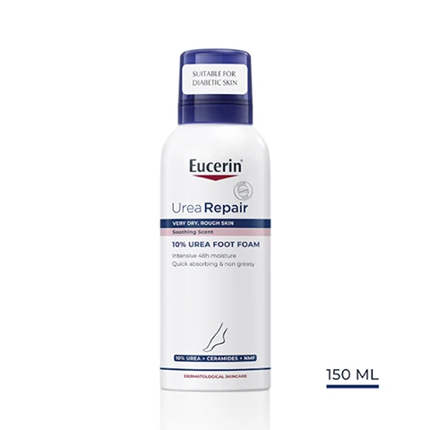 Image 1 - A bottle of Eucerin Urea Repair 10% Urea Foot Foam, labeled as suitable for diabetic skin, with a white background and visible text indicating 150 ML.
              Image 2 - Image of a hand applying cream to a foot, with text that reads Key Benefits, Intensive 48h moisture, Quick absorbing & non greasy, With soothing scent.
              Image 3 - A hand holding a bottle of Eucrin Urea Repair foot foam, with text on the side stating Dry, rough skin, Moisturising, and For feet.
              Image 4 - A dollop of white cream is shown with labels pointing to key ingredients: 10% Urea, Ceramides, and Natural Moisturisers.
              Image 5 - A blue background with rays of light features the text Consumers confirm Moisturises and relieves very dry skin, along with a small note at the bottom about a product in use study involving 172 women with dry skin.
              Image 6 - Image shows three Eucerin Urea Repair products arranged sequentially with the labels indicating a recommended skincare routine: left is a shower gel, center is a 10% lotion, and right is a foot foam, along with the title Recommended Routine and numbers 1, 2, and 3 above each product.