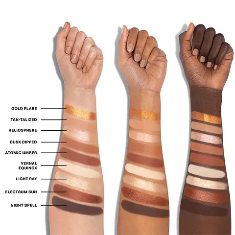 Image 1, Model arm swatch of all shades in the palette that includes the following: Gold flare, Tan talized, Heliosphere, Dusk dipped, Atomic umber, vernal equinox, light ray, electrum sun and night spell. Image 2, Experience the multi effects- mattes and shimmers that provides major pigment payoff and blend and shine like a dream. Duo chromes- catch the light with shade shifting metallic effects. Silk slip topper- Level up eye looks and double as highlighters