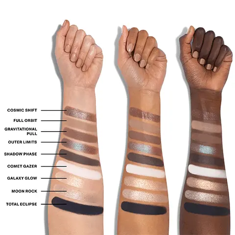 Image 1, Model arm swatch of all shades in the palette that includes the following: GCosmic shift, Full orbit, Gravitational pull, Outer limits, Shadow phase, Comet gazer, Galaxy glow, Moon rock and Total eclipse. Image 2, Experience the multi-effects- mattes and shimmers that provides major pigment payoff and blend and shine like a dream. Duo chromes- catch the light with shade-shifting metallic effects. Silk slip topper- Level up eye looks and double as highlighters