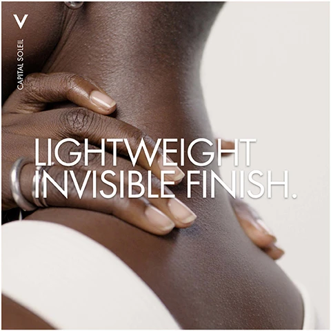 Image 1 - A close-up image of a person’s neck and shoulder with hands gently resting on the skin, featuring visible text that reads CAPITAL SOLEIL LIGHTWEIGHT INVISIBLE FINISH.
              Image 2 - An orange spray bottle of Vichy Capital Soleil sunscreen with the text ADVANCED UV PROTECTIVE FILM TECHNOLOGY, SPF 50+, UVB, UVA, LONG UVA, and CELL PROTECT INVISIBLE WATER FLUID SPRAY.
              Image 3 - A woman with long dark hair is holding a bottle of sunscreen while sitting with her legs crossed, wearing a white swimsuit against a light background. The visible text on the sunscreen bottle includes SPF 50.
              Image 4 - Image shows two sun protection products by Vichy on a textured white background; the left bottle labeled For Face: UV-Age Daily and the right labeled For Body: Cell Protect Water Fluid Spray with a sun protection factor of 50.
              Image 5 - A person in a white coat holds a bottle of Vichy Capital Soleil sunscreen, with the text on the left reading Hypoallergenic Non-greasy Tested by Dermatologists.