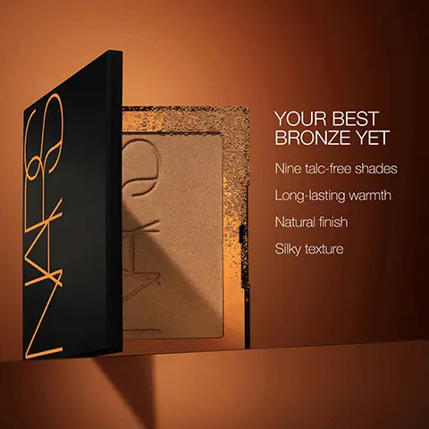Image 1, YOUR BEST BRONZE YET Nine talc-free shades Long-lasting warmth Natural finish Silky texture Image 2, PICK YOUR NARS BRONZER LAGUNA BRONZING CREAM MBS LAGUNA BRONZING POWDER FORMULA Decadently creamy texture that seamlessly glides on natural, second-skin warmth Silky, finely milled powders that deliver a natural, long-lasting glow BENEFITS Five sunkissed shades deliver long-lasting color. Featuring Monoi de Tahiti Oil to lock in moisture, tone, and firm complexion Nine talc-free shades easily build and blend while translucent micro-spheres smooth skin texture for perfected complexion PRO TIP For long-lasting color, use Laguna Bronzing Cream to add depth and dimension. + Follow with a light dusting of Laguna Bronzing Powder to set the cream formula. Image 3, Convert your bronzer shade to NEW Laguna Bronzing Powder. IF YOU WORE... TRY... MATTE BRONZING POWDER IN VALLARTA LAGUNA 00 BRONZING POWDER IN LAGUNA LAGUNA 02 (ORIGINAL) MATTE BRONZING POWDER IN LAGUNA LAGUNA 03 BRONZING POWDER IN CASINO LAGUNA 04 8 MS 3 MS T3 MS MATTE BRONZING LAGUNA 05 POWDER IN QUIRIMBA M3
