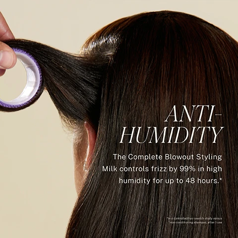 Image 1 - A person with long, shiny hair is holding a hair roller near their hair, and the text reads ANTI-HUMIDITY The Complete Blowout Styling Milk controls frizz by 99% in high humidity for up to 48 hours.*
              Image 2 - A woman with long, straight hair rests her head back, while a round brush with black bristles is placed against her shiny hair, and text in the image reads, STYLE MEMORY Hair treated with Blowout Styling Milk maintains style for up to 48 hours* In a controlled hair swatch study versus non-conditioning shampoo, after 1 use.
              Image 3 - A split image showing two women with different hairstyles; the woman on the left has curly hair and the woman on the right has straight hair, with visible text stating WITHOUT on the left and WITH: COMPLETE BLOWOUT STYLING MILK along with HAIR NOT RETOUCHED at the bottom.
              Image 4 - A split image displays a woman with long gray hair; the left side shows her without styling and the right side shows her styled with defined waves, accompanied by visible text stating WITHOUT on the left and WITH: COMPLETE BLOWOUT STYLING MILK on the right, along with HAIR NOT RETOUCHED at the bottom.
              Image 5 - A close-up of a hair straightener smoothing shiny, straight hair with the text that says SMOOTH and PROTECT, Hair prepped with Blowout Styling Milk was 5x smoother* and protected from heat up to 450°F*.
              Image 6 - A person with long, wavy brown hair is shown from the side, with a blurred background of yellow foliage; the image contains text about a heat-activated styling milk, attributed to Jonathan Van Ness, celebrity hairstylist and founder of JVN Hair.
              Image 7 - A series of three images showing a woman with long hair applying hair product, styling her hair, and using a hair dryer, with visible text detailing three steps: STEP 1 Apply 1-2 pumps in hands and rub together. STEP 2 Apply to hair starting with mid-shafts & ends and finishing with your roots. STEP 3 Blow dry, flat iron, curl or wave to your heart’s desire!