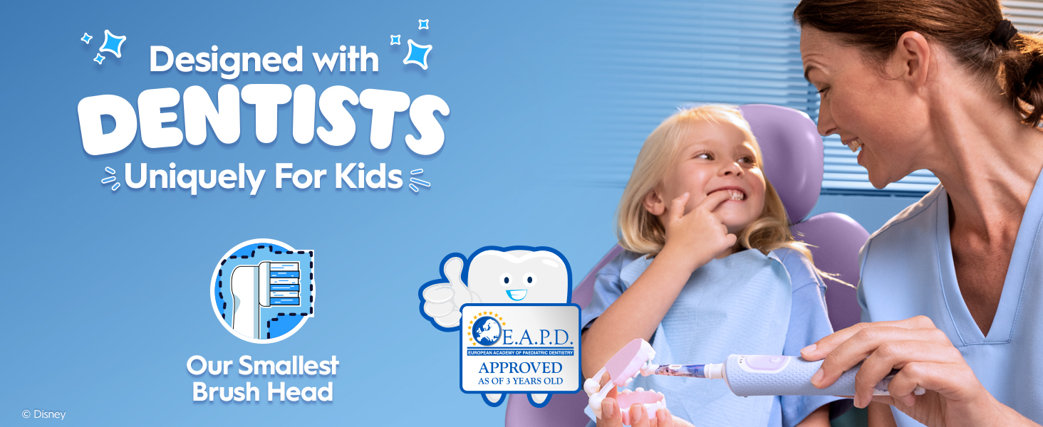 A dentist helps a young child brush with a blue electric toothbrush featuring a Frozen design. Text: “Designed with Dentists, Uniquely for Kids” and “Our Smallest Brush Head.”