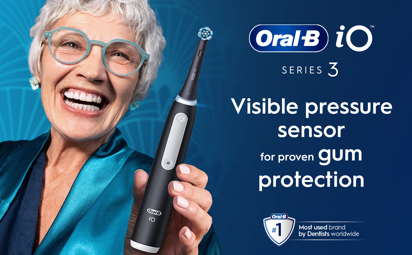 Close-up of a woman with an Oral-B iO Series 3 electric toothbrush featuring a visible pressure sensor for proven gum protection.