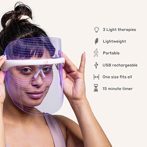 Image 1 - A woman is holding a transparent purple light therapy mask in front of her face, with visible text beside her detailing features: 3 Light therapies, Lightweight, Portable, USB rechargeable, One size fits all, 15 minute timer.
              Image 2 - An illustration showing three facial masks representing LED therapy: the top section features red LED with text indicating 620-750nm and benefits for lines and wrinkles, the middle section displays yellow LED with text indicating 590-620nm and benefits for radiance and glow, and the bottom section presents blue LED with text indicating 476-495nm and benefits for blemishes and oiliness.
              Image 3 - A woman is wearing a transparent visor with orange lines, smiling, and there are icons indicating a platinum beauty award and the text Menopause Friendly with a check mark.
              Image 4 - A person wearing a blue LED facial mask, with visible text on the right side listing features such as Customisable Light Modes, Hands-Free & Comfortable, Boosts Collagen Production, Reduces fine lines & wrinkles, USB Rechargeable, Fights Acne & Breakouts, Reduces Redness & Soothes Skin, and Tri-Colour LED Light Therapy.
              Image 5 - A woman smiles while holding two gray makeup removal pads over her eyes, with text on the right highlighting features such as removes makeup with just warm water, wash and reuse thousands of times, bamboo microfibre, super soft, ideal for sensitive skin, machine washable at 30°C, and eco-friendly.
              Image 6 - Image shows a comparison of a microfibre bamboo cleansing cloth in dry and wet states, with the word WIPE OUT and the text Microfibre Bamboo Cleansing Cloths above, and under each side it reads DRY on the left and WET on the right.
              Image 7 - A stack of rolled gray makeup removal cloths made of 100% bamboo microfibre on a marble surface, with text indicating they remove makeup with warm water, can be reused thousands of times, and are plastic-free.