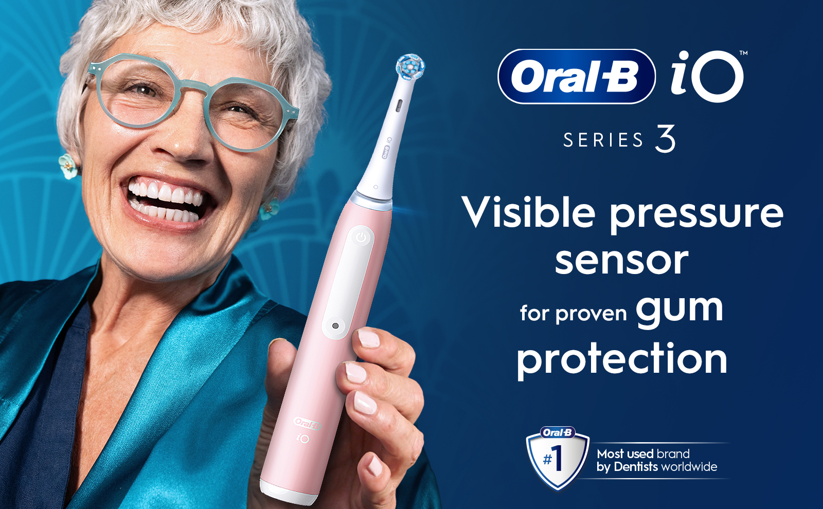 Close-up of a woman with an Oral-B iO Series 3 electric toothbrush featuring a visible pressure sensor for proven gum protection.