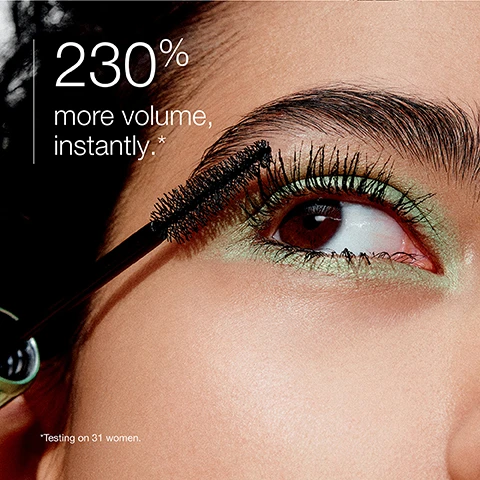 Image 1 - A close-up image of an eye with vibrant green eyeshadow and long, thick lashes being enhanced by a mascara wand, accompanied by the text 230% more volume, instantly and a footnote stating Testing on 31 women.
              Image 2 - Image shows a close-up of an eye with long eyelashes; the top section is labeled Before and shows sparse lashes, and the bottom section is labeled After application and displays fuller, longer lashes.
              Image 3 - A mascara brush with a wavy design stands upright beside a sweeping stroke of black mascara on a light background, with text that reads High-Def Wave Brush coats + combs every lash and Precision tip defines corner lashes.
              Image 4 - A close-up of a persons face focusing on an eye being enhanced with mascara, featuring text that reads The Clinique Eye Safety Promise. Hard-working makeup thats easy on the eyes. Ophthalmologist tested. Safe for sensitive eyes. Safe for contact lens wearers.