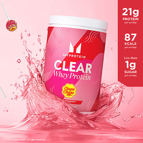 Image 2-myprotein-en_GB - A pink and red Myprotein Clear Whey Protein tub with a white lid, featuring a Chupa Chups logo and Strawberry Flavour Edition text, is surrounded by pink liquid splashes, with two Chupa Chups lollipops in the background, and text on the right stating 21g PROTEIN per serving, 87 KCALS per serving, Less than 1g SUGAR per serving, and at the bottom left © 2025 Chupa Chups®. All rights reserved.