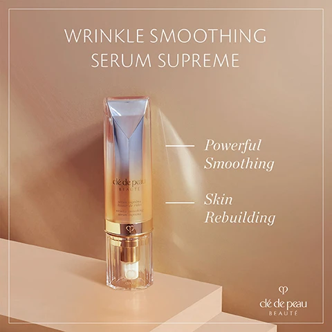 Image 1 - A bottle of Clé de Peau Beauté Wrinkle Smoothing Serum Supreme is displayed on a light background, with text that reads Wrinkle Smoothing Serum Supreme, Powerful Smoothing, and Skin Rebuilding.
              Image 2 - A woman with long brown hair lightly touches her face while looking directly at the camera, and the image includes the text Visibly reduces DEEP WRINKLES Improving skin texture clè de peau BEAUTÉ.
              Image 3 - A woman with medium skin and light brown hair holds a skincare product against her cheek, wearing gold earrings and a dark blouse, with text stating In 2 weeks, wrinkles visibly decrease in length & number and a footnote about tests conducted on women aged 31 to 55.