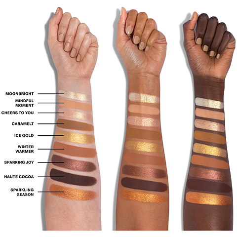 swatches of - moonbright, mindful moment, cheers to you, caramelt, ice gold, winter warmer, sparking joy, haute cocoa, sparkling season on three different skin tones