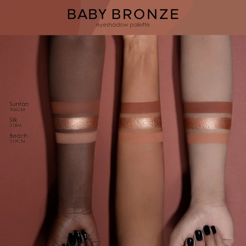 baby bronze eyeshadow palette. swatches of suntan 30cm, silk 318m, beach 319cm on three different skin tones