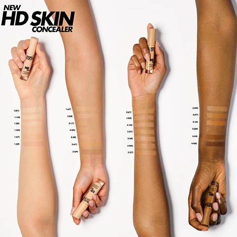 Image 1, swatches on new HD skin concealer on 4 different skin tones. image 2, highlight, conceal and contour. image 3, shades 1(Y), 1.1(n), 1.2(R), 1.3(N), 1.4(y), 1.5(r) and 1.6(y) on 7 different skin tones. image 4, shades 2(r), 2.1(y) 2.2(n), 2.3(r), 2.4(y), 2.5(n), 2.6(y) on 7 different skin tones. image 5, shades 3(r), 3.1(n), 3.2(y), 3.3(r), 3.4(n), 3.5(y) and 3.6(n) on 7 different skin tones. image 6, shades 4(y), 4.1(r), 4.2(n), 4.3(r) and 4.4(n) on 6 different skin tones. image 7, love UHD concealer? find your closest match in our new formula. 11 = 1. 12 = 1.2, 12 and 20 = 1.2, 22 and 30.5 = 1.3, 21 = 1.4, 25 and 32 = 1.5, 30 = 1.6. image 8, 26 shades, natural finish, light to medium coverage. all skin types. image 9, highly flexible to reach every spot. super soft for a perfect fusion with the skin. medium sized, for a precised yet easy application.