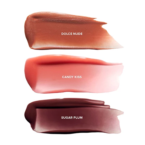 Image swatches of dolche nude, candy kiss, sugar plum. Image 2, before and after sugar plum, after candy kiss, after dolche nude. Image 3, dolche nude, candy kiss and sugar plum on 3 different skin tones. Image 4, 86% of consumers agreed that their lips looked juicer after first use. 100% of consumers agreed that their lips felt moisturized after first use. 100% of consumers agreed that their lips felt soft after first use. Image 5, increase hyaluronic acid up to 101% and locks in moisture up to 50%. enhance overall lip matrix up to 130%. up to 15% increase in lip plumping. Image 6, avocado butter, 2% tripeptide complex, shea butter. Image 7, why it works hydra peptide lip butter. avocado butter is an antioxidant that hydrates and softens. shea butter has vitamin a and e that softens, soothes and protects. 2% tripeptide complex has peptides which plump, lock in moisture and add volume. 3 in 1 lip butter - hydrating, plumping gloss. Image 8, swatches of dolche nude, candy kiss and sugar plum