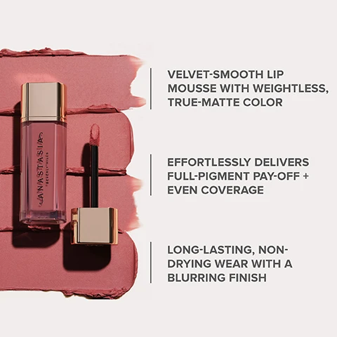 Image 5 - A gold-capped tube of Anastasia Beverly Hills lip mousse in a dusty rose shade, with its applicator wand pulled out showing the product, rests on swatches of the lip mousse, alongside descriptive text that reads: VELVET-SMOOTH LIP MOUSSE WITH WEIGHTLESS, TRUE-MATTE COLOR, EFFORTLESSLY DELIVERS FULL-PIGMENT PAY-OFF + EVEN COVERAGE, LONG-LASTING, NON-DRYING WEAR WITH A BLURRING FINISH. Image 6 - A close-up image of a brown liquid makeup product bottle with a metallic rose gold cap, next to an inset showing its applicator with a pointed tip and cushioned paddle, accompanied by text that reads ALL ABOUT THE BRUSH Shape, fill + define with the custom-designed applicator. TIP PADDLE POINTED TIP Precision lining + detailing CUSHIONED PADDLE Easy, one-swipe coverage + even color and the partial brand name ANASIA vertically on the bottle. Image 7 - A comparison chart displays five different lip products: Lip Velvet, Satin Lipstick, Matte Lipstick, Liquid Lipstick, and Lip Gloss, each with a model wearing the product, a description, and an image of the product itself, along with the text LIP VELVET WHY YOU WANT IT Velvety-Smooth, Mousse Formula Full-Pigment, Matte Color Soft-Matte Finish SATIN LIPSTICK WHY YOU WANT IT Creamy, Soft Formula Sheen & Luminosity Satin Finish MATTE LIPSTICK WHY YOU WANT IT Velvety, Soft Formula Creamy, Matte Color Matte Finish LIQUID LIPSTICK WHY YOU WANT IT Long-Lasting, Liquid Formula Full-Coverage Color Powder-Matte Finish LIP GLOSS WHY YOU WANT IT Long-lasting, Glass-Like Shine Weightless, Non-Sticky Formula High-Shine Finish. Image 8 - A color chart displays makeup product names alongside their respective swatches, featuring categories LIP VELVET with shades Pure Hollywood, Peachy Nude, Kiss, Parchment, Crush, Peach Amber, Pink Sand, Softy, Pale Mauve, Rosy Mauve, Hush Rose, Blackberry, Pomegranate, Cool Brown; LIP LINER NATURAL SCULPT with shades Muted Mauve, Warm Taupe, Sun Baked, Parchment, Mocha, Peach Amber, Baby Roses, Mocha, Deep Taupe, Dusty Rose, Dusty Rose, Blackberry, Cranberry, Cool Brown; and LIP LINER NEXT-LEVEL SCULPT with shades Deep Taupe, Cool Brown, Dusty Rose, Chai, Malt, Sandstone, Mocha, Warm Taupe, Rosewood, Rosewood, Rosewood, Raisin, Chai, Malt. Image 9 - A close-up of a person applying nude lipstick to their upper lip with an applicator, showing their freckled skin and eye makeup, with text that reads HOW TO APPLY Start by lining your lip shape with the pointed-tip of the applicator. Then, fill in the center of the lips using the flat side of the applicator.