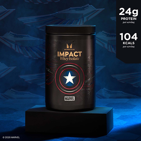 A black protein powder container with a Captain America shield design sits on a dark pedestal against a blue background with faint shield patterns, displaying text that reads MYPROTEIN Impact Whey Isolate Marvel, 24g protein per serving, 104 kcals per serving, and © 2025 Marvel.
