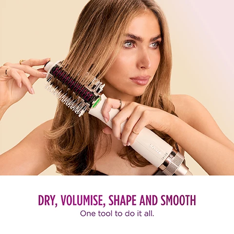Image 1, dry, volumise, shape and smooth one tool to do it all. image 2, dry hair mode and wet hair mode. a whole lot more than a blowdry brush, one tool, two modes always smooth results. image 3, get the perfect wash-day style. use wet hair mode for wet to dry volumising and styling with no heat damage. image 4, designed to maximise hair alignment volume and shape. heated smoothing comb technology. perfect or refresh dry hair. switch to dry hair mode to smooth, align and shape without the frizz vs air drying based on a 600 person survey. image 5, less heat for healthy looking hair. smooth style priorities safer for hair temperatures and efficient heating. image 6, smooths and polishes with lower hair temperatures, shark's integrates comb smooths your hair, maintaining its shape and movement. vs traditional flat irons. image 7, heated smoothing comb technology for voluminous, smooth and soft hair with shape and bounce. image 8, dried wet hair with no heat damage. smooth style never reaches hair damaging temperatures in wet hair mode. image 9, wash day fresh and next day refresh. use both modes on wash days, or fix bedhead gym hair or ponytail creases with heated smoothing comb on non wash days. image 10, for all hairkind. smooth style brings power to any hair type. smooth and volumise straight, wavy, curly or coily hair. image 11, straight hair results, after wet hair mode and after dry hair mode. image 12, wavy hair results after wet hair mode and after dry hair mode. image 13, curly hair results after wet hair mode and after dry hair mode. image 14, coily hair after wet hair mode and after dry hair mode. image 15, what's inside the box - includes heat resistant storage bag, easily take smooth style wherever you go.