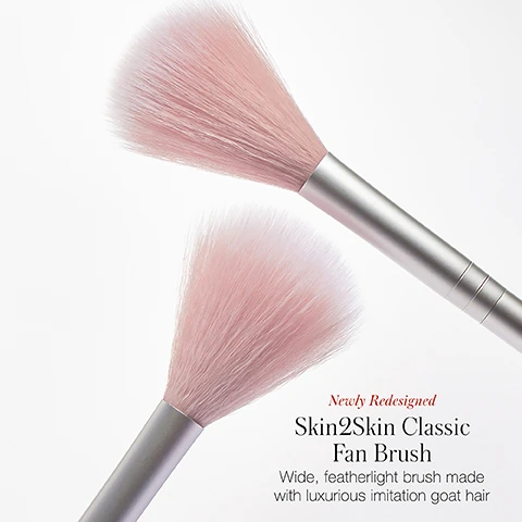 newly redesigned skin2skin classic fan brush. wide featherlight brush made with luxurious imitation goat hair