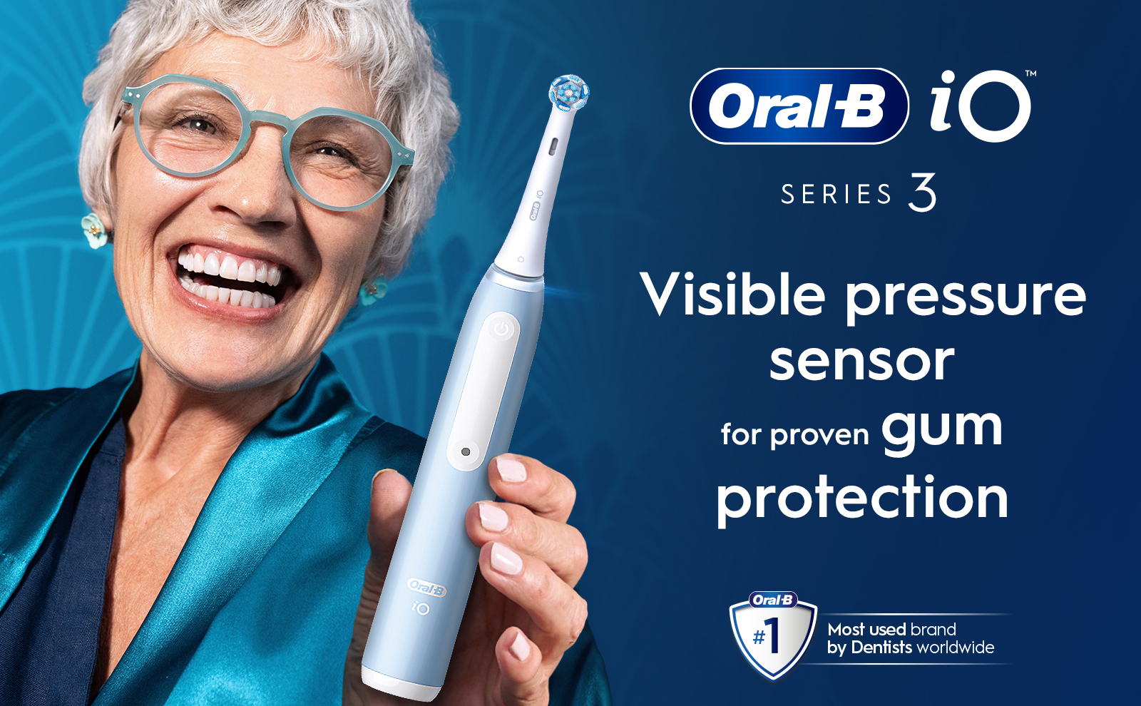 Close-up of a woman with an Oral-B iO Series 3 electric toothbrush featuring a visible pressure sensor for proven gum protection.