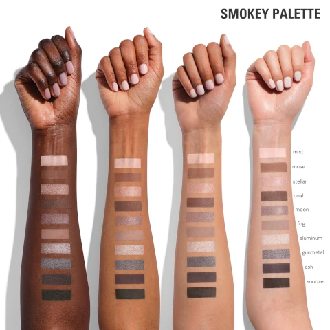 swatches of shades in the smokey palette - mist, muse, stellar, coal, moon, fog, aluminium, gunmetal, ash and snooze on 4 different skin tones.