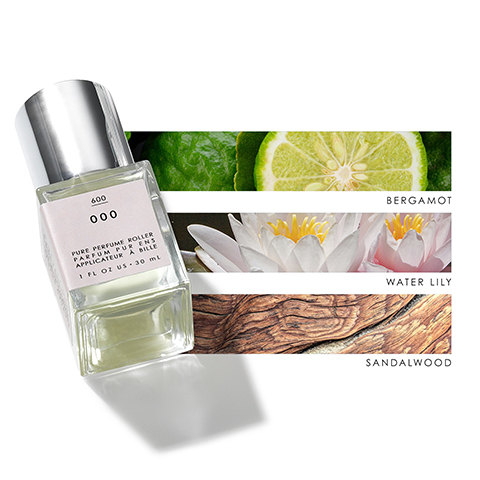 Image 1 - A clear glass perfume roller bottle with a silver cap is positioned at an angle beside three horizontal swatches featuring a slice of lime, a water lily flower, and a piece of wood, labeled with the scents bergamot, water lily, and sandalwood, respectively, and includes the text PURE PERFUME ROLLER and 1 FL OZ US - 30 ML.