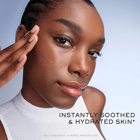 Image 1 - A close-up image of a woman with smooth skin and dark hair, gently touching her cheek with one hand while looking at the camera, with the text INSTANTLY SOOTHED & HYDRATED SKIN visible at the bottom, along with the note *SELF ASSESSMENT, 81 WOMEN, IMMEDIATE USE*.
              Image 2 - A woman with slicked-back hair applies a drop of serum to her cheek with a dropper, and visible text on the bottom left states 93% say skin looks smoother, 90% say skin quality looks improved, and 82% say skin looks more glowing & luminous.
              Image 3 - A promotional image featuring two bottles of Lancôme skincare products, one labeled Advanced Génifique Strength Radiance and the other labeled New Génifique Ultimate, with text stating Reverses visible skin damage and a note about the appearance of fine lines and wrinkles.
              Image 4 - A young woman with smooth skin and a subtle glow touches her cheek, wearing a shiny silver top, with the text suitable for all skin types, including sensitive skin displayed below her.