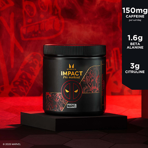 A black tub of Myprotein Impact Pre-workout, branded with MYPROTEIN IMPACT Pre-workout, a Deadpool symbol, and MARVEL logo, sits on a black pedestal against a red background with comic illustrations, along with text listing 150mg CAFFEINE per serving, 1.6g BETA ALANINE, 3g CITRULINE, and copyright © 2025 MARVEL.