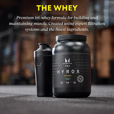 Image 1 - A black protein supplement container next to a black shaker bottle, with the text THE WHEY in large yellow letters, and additional text below describing it as a premium tri-whey formula for building and maintaining muscle.
Image 2 - A fit woman in a bright yellow sports bra and matching shorts is exercising, with a man in colorful shorts visible in the background; the image includes text that reads 25g PROTEIN, 5.7g BCAAs, 1.1g SUGAR, THE WHEY, and OPTIMISE YOUR RECOVERY.
Image 3 - Two men are actively using rowing machines in a gym setting, with one man in the foreground focusing on his workout while the other is seated in the background; below the image, there is text including manufacturing and customer care details for THG Nutrition India, along with an FSSAI logo and contact information.