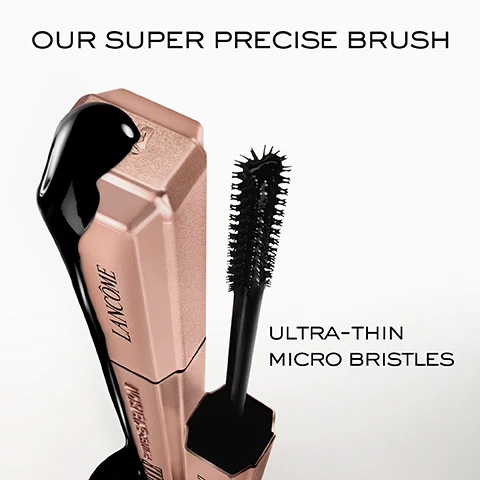 Image 1 - A black mascara brush with ultra-thin micro bristles is shown next to a rose gold tube labeled Lancôme, with the text OUR SUPER PRECISE BRUSH and ULTRA-THIN MICRO BRISTLES displayed in bold above and below.
              Image 2 - A grid of six close-up images showing the transformation of eyelashes, with one row labeled Before and the other After, illustrating the difference in length and fullness, accompanied by text stating UP TO +5.5MM VISIBLY LONGER LASHES* and a note at the bottom indicating *INSTRUMENTAL TEST ON 28 WOMEN.