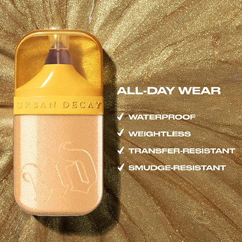 Image 3 - A gold bottle of Urban Decay product sits against a shimmering gold background, with text that reads ALL-DAY WEAR, followed by checkmarks for WATERPROOF, WEIGHTLESS, TRANSFER-RESISTANT, and SMUDGE-RESISTANT.
              Image 4 - A close-up portrait of a woman with light brown hair and subtle makeup, showing her face turned slightly to the side, with the text Carolina Wears Silver Lake visible at the bottom of the image.
              Image 5 - A woman with dark skin and a headscarf poses closely with a woman of lighter skin, both showcasing glowing skin, with the text GOLDEN HOUR, EVERY HOUR and Experience our waterproof Luminizer for an up to 12-hour radiant finish* visible in the image.
              Image 6 - A close-up image of a person with braided hair showcasing different makeup applications on their face and shoulders, with visible text labels reading AS A HIGHLIGHTER, MIXED WITH FOUNDATION, AS AN EYESHADOW TOPPER, and MIXED WITH BODY OIL.
              Image 7 - A close-up image of a woman with long, wavy dark hair, wearing a subtle makeup look with warm tones, highlighted cheekbones, and glossy lips; visible text reads JESS WEARS HALF BAKED.
              Image 8 - A close-up of a woman with blue eyes and smooth skin, adorned with stylish earrings and long, light purple nails, accompanied by the text Carolina Wears PCH.
              Image 9 - A close-up portrait of a woman with braided hair wearing a gold earring, showcasing smooth skin and a natural makeup look, with the text Jasmine wears Golden Hour located at the bottom left.
              Image 10 - A close-up portrait of a woman with dark skin and an orange headscarf, displaying bold makeup and gold hoop earrings, with the text KHADIJA WEARS HIGH PROFILE.
              Image 11 - A close-up portrait of a woman with light makeup and a smooth complexion, wearing gold hoop earrings and a ring, with the text Jamie Wears Mirrorball at the bottom.
              Image 12 - A woman with long dark hair and subtle makeup poses closely to the camera, highlighting her features; visible text reads JESS WEARS SPACE COWBOY.