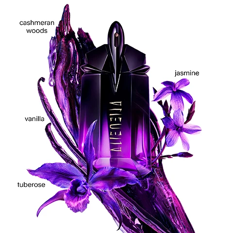 Image 1 - A purple perfume bottle is surrounded by vividly colored flowers and abstract paint splashes, with the words cashmeran woods, vanilla, jasmine, and tuberose displayed next to their corresponding floral illustrations.
              Image 2 - A woman with dark skin and long hair poses against a vibrant purple background, showcasing two perfume bottles labeled Alien, with the text Mugler at the top and NEW above one of the bottles, along with the phrase The Refillable Fragrances.