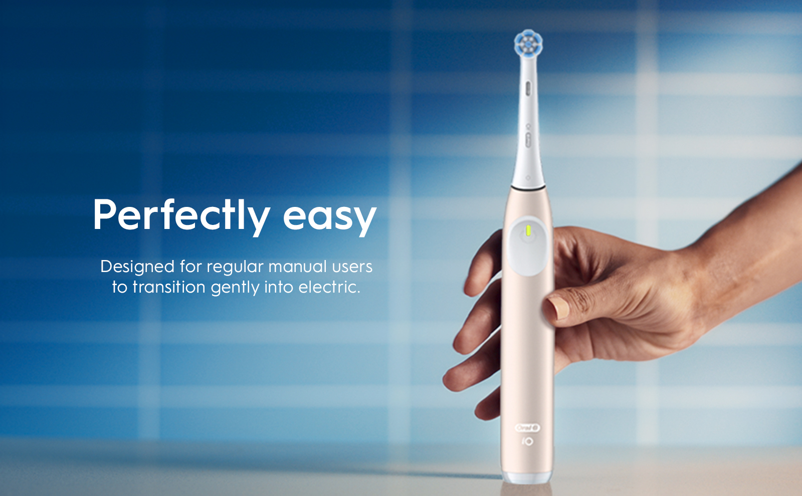 Oral-B iO2 electric toothbrush, emphasizing its ease of use and quiet operation.