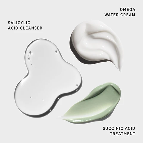 Image 1 - Three cosmetic products are displayed: a transparent liquid labeled Salicylic Acid Cleanser, a white cream labeled Omega Water Cream, and a green treatment labeled Succinic Acid Treatment, all positioned on a light gray background.
              Image 2 - Image shows three skincare products arranged on a white background: a bottle labeled Salicylic Acid Cleanser, a tube labeled Succinic Acid Treatment, and a jar labeled Omega Water Cream, along with the text Clinically tested 3-step routine to visibly reduce blemishes and excess oil, and numbers indicating each step: 1 CLEANSE, 2 TREAT, 3 MOISTURIZE.
              Image 3 - An image of a person holding a product package labeled THE INKEY LIST HYDROCOLLOID INVISIBLE PIMPLE PATCHES, which includes details about the products benefits, formulation, and clinical results, featuring visible text that states Includes 12X FREE Hydrocolloid Invisible Pimple Patches CLINICALLY PROVEN RESULTS IN 4 HOURS*.