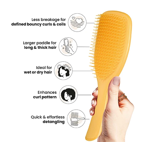 Image 1 - A person holding a yellow paddle brush is shown with icons and text describing its features: less breakage for defined bouncy curls and coils, larger paddle for long and thick hair, ideal for wet or dry hair, enhances curl pattern, and quick and effortless detangling.
              Image 2 - A woman with curly hair smiles while holding a yellow hairbrush, and the text reads Firm-flex teeth for curly to coily hair.
              Image 3 - Image shows a side-by-side comparison of curly hair labeled Before on the left and After on the right, featuring curly hair that appears smoother, with text stating 83% agree it easily removes knots and tangles and 81% agree it glided through their curls and coils, along with a note below indicating a survey of 102 UK respondents aged 16-45 testing after 2 weeks in 2020.
              Image 4 - Image shows three hairbrushes labeled as Mini, Regular, and Large with measurements for each: Mini is 6.1 inches by 2.1 inches, Regular is 8.7 inches by 2.6 inches, and Large is 9.3 inches by 3.1 inches, along with recommended hair types for each size and a note on the Large brush that says for larger daily detangling.