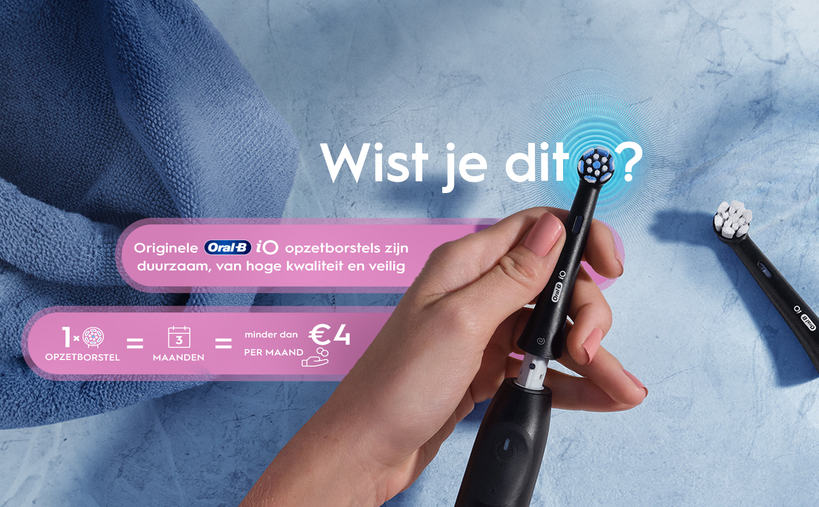 A person is holding an electric toothbrush with a detachable brush head against a light blue background, with text that reads Wist je dit? and additional information about the benefits of Oral-B iO toothbrush heads, stating they are durable, high quality, and safe.