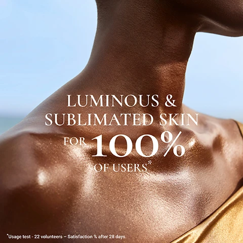 Image 1 - A close-up of a persons neck and shoulder showcasing glowing, radiant skin with the text LUMINOUS & SUBLIMATED SKIN FOR 100% OF USERS* below it.
              Image 2 - A shimmering golden abstract background with the text 100% NATURAL ORIGIN PEARLY PARTICLES.