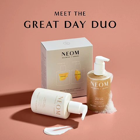 Image 1 - A white bottle of hand lotion and a golden bottle of hand wash are displayed next to their box labeled NEOM, with the text MEET THE GREAT DAY DUO prominently featured above.
              Image 2 - Image of two NEOM skincare products, a hand wash and a hand lotion, placed on a soft pink background, with the text stating 86% said the fragrance instantly boosted their mood and an asterisk noting an independent blind study on 68 people, after 2 weeks.
              Image 3 - A bottle of NEOM Great Day Hand Wash in a gold container with a white pump sits against a pink background, featuring text about its uplifting ingredients and benefits.
              Image 4 - A person is holding a cream-colored hand lotion bottle labeled NEOM WELLBEING LONDON GREAT DAY HAND LOTION, with text on the left indicating the bottle is 100% recyclable and contains 100% natural fragrances.