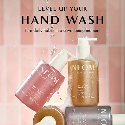 Image 1 - Three bottles of NEOM hand wash in shades of pink, gold, and gray are shown against a pink tiled background with water droplets, featuring the text LEVEL UP YOUR HAND WASH Turn daily habits into a wellbeing moment.
              Image 2 - A pink bottle of NEOM Complete Bliss Hand Wash is displayed with a pump top and a few drops of liquid coming from the spout, accompanied by text describing its ingredients and benefits including blush rose, lime, black pepper, pomegranate, chamomile extracts, and aloe vera.
              Image 3 - Two bottles of NEOM wellbeing products: a pink hand wash bottle on the left labeled COMPLETE BLISS HAND WASH and a white hand lotion bottle on the right, both on a light pink background with text stating 100% recyclable bottle designed to be refilled and reused and 100% natural fragrances that turn everyday moments into a wellbeing experience.
              Image 4 - A hand is shown with a liquid being dispensed from a NEOM Wellbeing London bottle, with text stating 89% said it helps them to enjoy a moment of calm, followed by a note about an independent study.