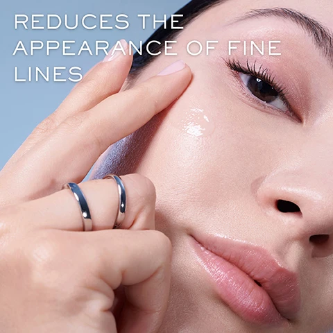 Image 1 - A person is applying a clear skincare product to their cheek while wearing two silver rings, with the text REDUCES THE APPEARANCE OF FINE LINES visible in the background.
              Image 2 - A close-up of a man gently touching his cheek, highlighting his clear skin, with the text 85% AGREE OVERALL APPEARANCE OF SKIN IS IMPROVED* and *Consumer Study with 34 women in the bottom corner.
              Image 3 - A close-up image of a woman applying a skincare product to her cheek, smiling, with the text 88% AGREE SKIN APPEARS SMOOTHER* and *Consumer Study with 34 women.
              Image 4 - Three close-up portraits of diverse women applying skincare products, with the text SKIN REGENERATES FASTER, EVEN AS YOU AGE at the top and the phrases TARGETS APPEARANCE OF DARK SPOTS*, FACE AND NECK FEEL LIFTED*, and WRINKLES APPEAR REDUCED* displayed prominently.