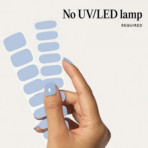 Image 1 - A hand holds sheets of light blue nail polish strips while wearing them on nails with the text No UV/LED lamp REQUIRED. Image 2 - Two light blue nail strips shown above the text 100% real salon-quality gel. Image 3 - Close-up of a hand with light blue nail polish touching glossy lips Lasts up to 14 days Image 4 - Hand with light blue painted nails and the text 1 minute removal NO DAMAGE. Image 5 - A four-step guide with illustrations showing how to apply nail wraps with the text Step by step 01 PREP Use a Wooden Cuticle Stick to gently push back your cuticles and buff the shine off your nail plates with a 240 grit nail file. Cleanse each nail using a Lint Free Wipe soaked in Prep & Wipe to remove any oils this helps the wraps adhere better and last longer. If you dont have these products, washing your hands is a good alternative. If your nails are naturally oily, apply Nail Dehydrator as an extra step after cleansing. 02 STICK & WRAP Choose your favourite design and select the right width wrap for each nail if youre between sizes, go slightly smaller. Peel the wrap from the sheet, touching only the end that wont go on the nail. Apply the wrap as close to the cuticle as possible without touching the skin. Press the wrap firmly from the centre outwards to avoid air bubbles. Use your thumb to press down and seal the edges. 03 TRIM & FILE Trim any excess as close to your nail length as possible using Curved Edged Scissors. After trimming, press the wrap firmly over the free edge of the nail, then file in only one direction, from top to bottom, using a 180 grit nail file. Lightly file underneath the free edge to remove excess and align the edges. Finish by pressing down again to fully seal the wrap in place. Avoid applying any oils or getting your hands wet for at least 2 hours after application to ensure maximum adhesion. Then youre set for up to 14 days! 04 REMOVE Quick, damage-free removal in just 1 minute. Apply Mylee Wrap Remover Oil around the edges of the wrap. Gently lift one side with a Wooden Cuticle Stick and slowly slide it underneath, adding more oil as needed. Once removed, wipe your nails and wash your hands. Image 6 - Image shows red nail polish strips and a list of features Easiest and gentlest mani in the world Lasts up to 14 days Fast & gentle 1-min removal Fully-cured - No LED Lamp required Comes in 10 sizes Long-lasting shine and chip-resistant Quick and easy application Hema-free, vegan, and cruelty-free Pre-cut and ready to go.