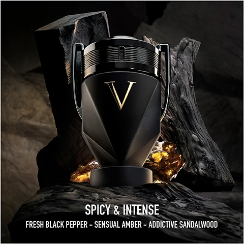 Image 1 - A dark, trophy-shaped perfume bottle with a gold V logo is placed on a dark background with pieces of wood and amber SPICY & INTENSE FRESH BLACK PEPPER - SENSUAL AMBER - ADDICTIVE SANDALWOOD. Image 2 - The image displays five Invictus trophy-shaped fragrance bottles labeled Eau de Toilette Parfum Victory Victory Elixir Victory Absolu with descriptions Aromatic & Fresh Woody & Clean Amber & Extreme Amber & Addictive Spicy & Intense and an intensity scale from + Fresh to + Intense.