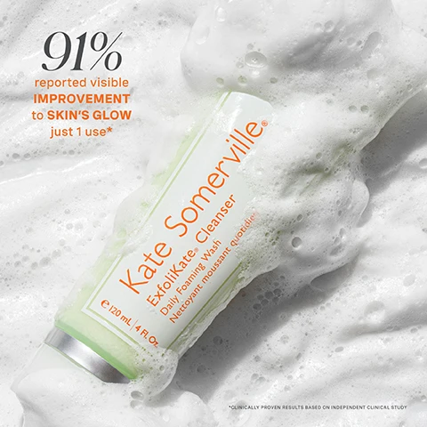 Image 1 - A foam-covered bottle of Kate Somerville Exfolikate Cleanser is shown, with bold text stating 91% reported visible improvement to skins glow just 1 use.
              Image 2 - A smiling woman with short hair and glowing skin holds a turquoise skincare product to her forehead against a green background, with text stating No White Cast, Deep Hydration, Illuminating Finish and AN SPF YOULL LOOK FORWARD TO WEARING.
              Image 3 - A split image shows a persons face with visible skin improvements; the left side labeled before shows redness and blemishes, while the right side labeled after 1 use shows clearer skin. Visible text includes before, after 1 use*, and clinically proven results based on independent clinical study.
              Image 4 - Three women with diverse skin tones smile while holding teal skincare products, with text above them reading protect + hydrate + illuminate and text at the bottom stating no. white. cast.