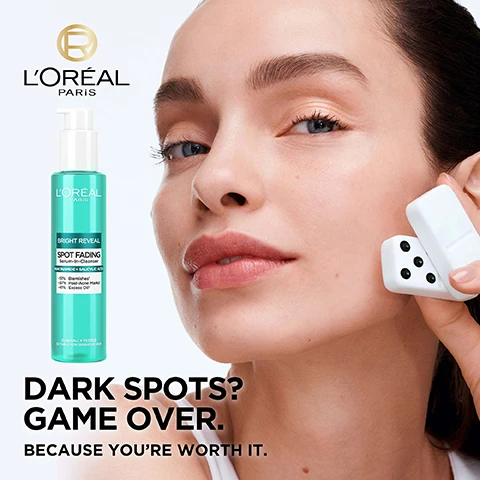 Image 2 - A woman with smooth skin applies a skincare product to her face, holding a small device in her hand; the product is LOreal Bright Reveal Spot Fading Serum, with text that reads DARK SPOTS? GAME OVER. BECAUSE YOURE WORTH IT.
              Image 3 - A turquoise bottle of LOréal Paris Bright Reveal Spot Fading Serum-in-Cleanser is displayed, with bubbles in the background; visible text includes Niacinamide helps reduce dark spots, Salicylic Acid gently exfoliates to help fade blemishes, and Clinically tested suitable for sensitive skin.
              Image 4 - An image of a LOreal Bright Reveal dark spot serum with a dropper, accompanied by circular graphics showing ingredients, including niacinamide, which helps reduce dark spots, and amino-sulfonic acid, which gently exfoliates for more even skin.
              Image 5 - Image of a LOréal Paris Bright Reveal Daily Fluid Tinted Moisturizer bottle on a light blue background, with the text highlighting its features: A powerful anti-dark spot UV protection, Protect: Broad Spectrum SPF 50, Correct: Even tone & visibly fade dark spots, and Cover: The appearance of dark spots & ageing signs.
              Image 6 - An image shows a close-up of a gel-like droplet against a soft turquoise background, with text indicating it is Powered by UVB + UVA filters prevent dark spots, 3% [Niacinamide] brighten & reduce dark spots, and 4% [Pigments + Pearls] even tone & illuminate skin.