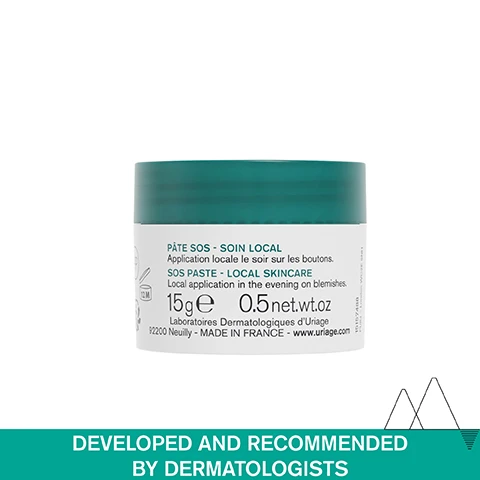 Image 1 - Image of a small jar of skincare paste with a teal lid, featuring labels in French and English that describe its use for local application on blemishes, along with the text developed and recommended by dermatologists.
              Image 2 - A close-up of a womans face showing her chin with two small droplets of thick green clay and her fingers gently touching her skin, accompanied by the text OILY SKIN PRONE TO BLEMISHES, Thick green clay texture, and Local care.
              Image 3 - A close-up image of a jar labeled SOS Anti-Blemish Paste with Tea Tree showing a teal lid and text indicating -56% Blemish Size* and Accelerates Blemishes Maturation.
              Image 4 - An infographic titled Advanced Dermatological Formula contains four sections, each describing an ingredient: Tea Tree, which accelerates spot maturation; Green Clay, which dries out spots; Zinc, which regulates the overproduction of sebum with purifying properties; and Uriage Thermal Water, which is 100% pure and natural, softens and soothes all skin types.
              Image 5 - A scenic view of snow-capped mountains under a blue sky features three icons and text that states Developed and recommended by dermatologists, Suitable for acne-prone skin, and High-tolerance.
              Image 6 - Image shows four skincare products from URIAGEs HYSEAC line on a light background, with labels indicating steps for a skincare routine: 1 Cleanse, 2 Correct, 3 Local day care, and 4 Local night care; the visible products include a cleansing gel, a corrective skin treatment, and a drying gel.
              Image 7 - A green and white jar of Uriage Hyseac SOS Paste with a small amount of cream on the side, featuring a blue circular badge that reads recommended by dermatologists.