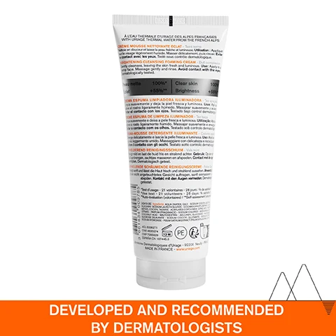 Image 1 - A tube of Brightening Cleansing Foaming Cream featuring multiple language descriptions, with a prominent orange label at the bottom stating DEVELOPED AND RECOMMENDED BY DERMATOLOGISTS.
              Image 2 - A close-up of a womans face showing a creamy face cleanser applied to her skin, with text labels indicating Ultra-creamy light foam, Unique floral scent, and Rinse-off face cleanser, along with the headline DARK SPOTS, DULL COMPLEXION.
              Image 3 - A tube of Uriage Dépiderm brightening cleansing foam is shown, featuring text that states +55% BRIGHTNESS* and LEAVING SKIN FRESH & LUMINOUS*.
              Image 4 - Image shows a promotional graphic for an advanced dermatological formula, featuring sections labeled MELA TECHNOLOGY, VITAMIN C, NIACINAMIDE, and URIAGE THERMAL WATER, with corresponding benefits listed for each ingredient.
              Image 5 - A scenic view of snow-capped mountains with three highlighted points of text stating Developed and recommended by dermatologists, Suitable for all skin types, and Non-comedogenic.
              Image 6 - Image features three skincare products from the Uriage Dépiderm line, labeled as steps 1, 2, and 3, including a cleansing foaming cream, a brightening booster serum, and a moisturizer with accompanying text for each product.
              Image 7 - A tube of Uriage Dépiderm Brightening Cleansing Foaming Cream is displayed, featuring a light-colored background with bubbles, and the visible text reads Recommended by Dermatologists, Dépiderm, Crème mousse nettoyante éclat, Brightening cleansing foaming cream, Cleanses, unifies, illuminates, Teint terne, Dull complexion, and Toutes peaux, All skin types.