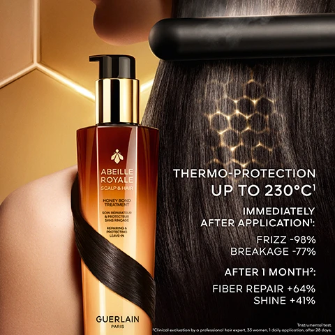 Image 1 - Abeille Royale Scalp & Hair Honey Bond Treatment by Guerlain is shown alongside a sleek, modern hair styling tool, with the text indicating thermo-protection up to 230°C and results of frizz reduction, breakage decrease, fiber repair, and shine improvement.
              Image 2 - A person with long, wavy hair is shown from behind in a split image; the left side labeled Before shows frizzy hair, while the right side labeled After displays smooth and shiny hair, accompanied by hexagonal shapes illustrating the hairs texture. Results obtained immediately after application of a hair treatment. Results may vary from one individual to another.
              Image 3 - Image shows a woman’s head and shoulders with curly hair, split into two sections labeled BEFORE and AFTER ONE USE, highlighting the difference in hair texture and smoothness, along with hexagonal symbols that read UNTRETOUCHED HAIR and SHOT UNDER THE SUPERVISION OF A BAILIFF and RESULTS MAY VARY FROM ONE INDIVIDUAL TO ANOTHER.
              Image 4 - A hexagonal glass container filled with a golden liquid sits at the center, surrounded by a textured background of honeycomb patterns, with the text BLACKBEE HONEY REPAIR TECHNOLOGY and a list of honey types and ingredients including OUESSANT ISLAND BLACKBEE HONEY, CORSICA HONEY, ÅLAND HONEY, IKARIA HONEY, PHYTOCERAMIDES, ARGININE, D-PANTHENOL, CASSIA ALATA EXTRACT.
              Image 5 - An image featuring a golden honeycomb pattern with a hexagonal droplet of a creamy substance at the center, surrounded by the text Honey Bond-Protect Complex™ and exclusive royal jelly, Åland honey & beeswax butter.
              Image 6 - Two hair care products are displayed against a honeycomb background, featuring the labels YOUTH OIL-IN-SERUM and HONEY BOND TREATMENT, both products are from Guerlain Paris.
              Image 7 - A beekeeper in protective gear walks along a coastal landscape covered in flowers, with a beehive labeled Guerlain visible beside him, and text above reads Since 2011, Guerlain has been a patron of the Association of the Ouessant Island Brittany Black Bee Conservatory (ACANB), supporting bee protection and scientific research.