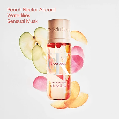 Image 1 - A Calvin Klein Sheer Peach Hair & Body Perfume Mist bottle with orange and pink liquid containing small particles, surrounded by apple and peach slices and watercolor splatters, featuring text Calvin Klein CK sheer peach hair & body perfume mist brume parfumée corps & cheveux 7.9 FL. OZ. 236 ml Peach Nectar Accord Waterlilies Sensual Musk. Image 2 - Three peach-colored perfume mist bottles lie on a white background, featuring the text CK sheer peach hair & body perfume mist brume parfumée corps & cheveux 7.9 FL. OZ. 236 mle, alongside a five-star customer review stating I absolutely love the smell of this mist, it smells so fresh and clean and Ive received so many compliments. I would 1000% recommend! Yumna, Home Tester Club. Image 3 - Four Calvin Klein hair and body perfume mists in peach, blue, pink, and green bottles, covered in water droplets, are displayed against a white background, Calvin Klein sheer peach hair & body perfume mist 7.9 FL. OZ. 236 ml e, Calvin Klein silky coconut hair & body perfume mist 7.9 FL. OZ. 236 ml e, Calvin Klein nude vanilla hair & body perfume mist 7.9 FL. OZ. 236 ml e, Calvin Klein cotton musk hair & body perfume mist 7.9 FL. OZ. 236 ml e, hydrating moisturising mood-boosting lightweight. Image 4 - Four colorful Calvin Klein body mist bottles, including Nude Vanilla, Sheer Peach, Cotton Musk, and Silky Coconut, are arranged on a persons shoulder wearing a white Calvin Klein bralette, with text that reads Wear alone or mix with another mist from the collection to create your own signature scent. Image 5 - A graphic displays four Calvin Klein fragrance mists, each in a 7.9 FL. OZ. 236 mL bottle labeled For friendly skin, alongside their names, notes, and fragrance families: Silky Coconut with coconut and pineapple notes (Gourmand); Sheer Peach with peach nectar and waterlilies notes (Fruity); Nude Vanilla with vanilla and pear notes (Vanilla); and Cotton Musk with white solar flowers and oakmoss notes (Floral).