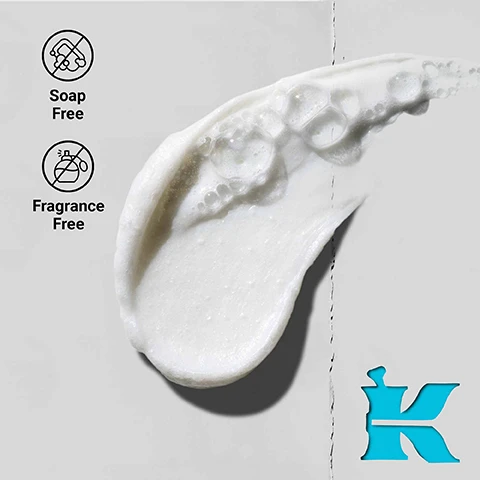 Image 1 - White creamy texture with bubbles, icons indicating Soap Free and Fragrance Free, and a blue stylized K logo. Image 2 - A young woman smiling and washing her face with foam, with the text SOAP-FREE AMINO ACID FORMULA. Image 3 - Image shows three clear drops of liquid on a white background with text that reads K Our Formula With* GLYCERIN Within our formula, hydrates and protects skin barrier AMINO ACID Based Surfactant Protects skin barrier while deeply cleansing SQUALANE Within our formula, helps replenish skin barrier *Based on a 150ml size. Image 4 - A tube of Kiehls Ultra Facial Barrier-Hydrating Cleanser is shown on a blue background with text overlay that reads Up To 24 HOUR Hydration*, Tested to help remove makeup & sunscreen, NON-STRIPPING, *Instrumental Test, 28 subjects, and text on the tube reads KIEHLS SINCE 1851 ULTRA FACIAL BARRIER-HYDRATING CLEANSER Cream-to-Foam Formula with Amino Acids, Squalane and Glycerin [detailed description and directions] unscented formula for all skin types 5.0 fl. oz. - 150 ml. Image 5 - A Kiehls 3-step skincare routine display features a white tube cleanser labeled Step 1 Cleanse Kiehls Ultra Facial Barrier-Hydrating Cleanser unscented formula 5.0 fl. oz., a white jar of cream labeled Step 2 Hydrate Kiehls Ultra Facial Cream Daily Lightweight Hydrating Formula 1.7 fl. oz., and a white jar of eye cream with yellow contents labeled Step 3 Hydrate Eyes Kiehls Creamy Eye Treatment with Avocado. Image 6 - A face under UV light shows a before and after comparison with text labels before AFTER* Helps remove sunscreen *Average Results, Individual Results May Vary.