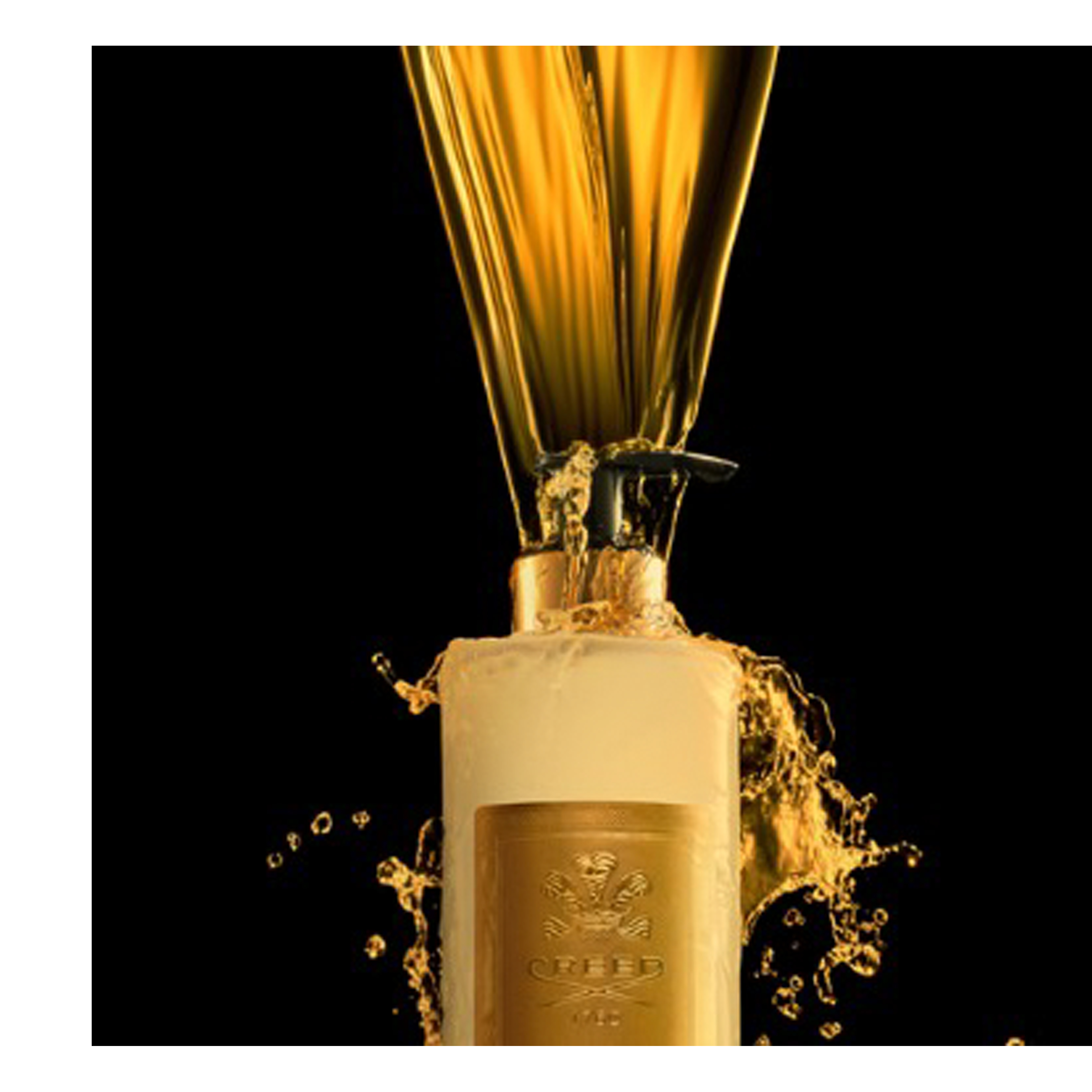Golden liquid pours and splashes from a light-colored pump dispenser bottle featuring a gold label with an emblem and the text CREED 1760 against a black background